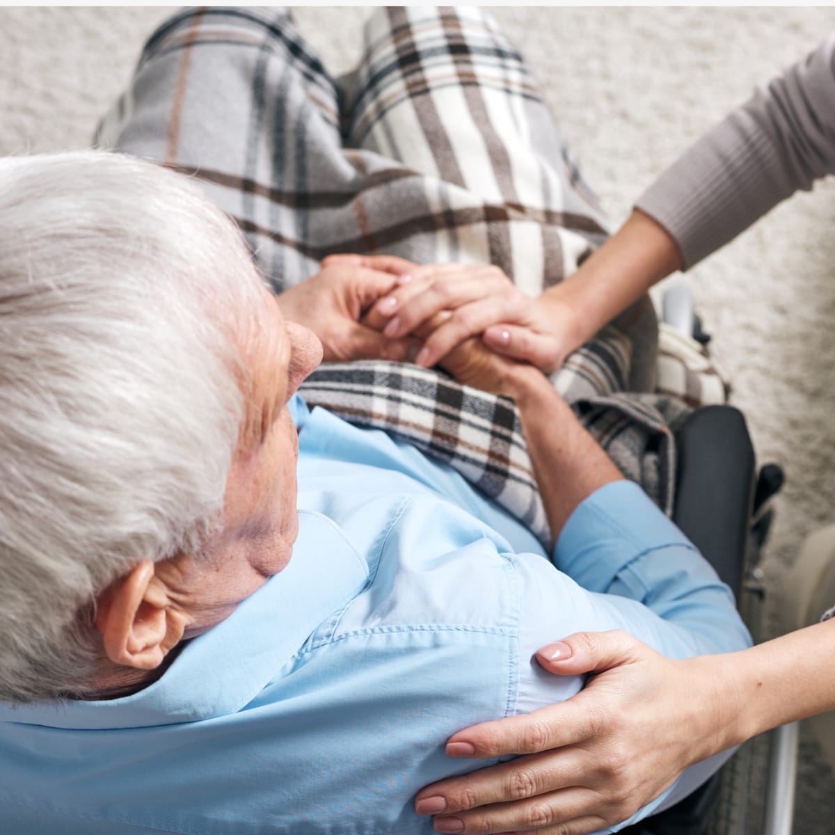 Older man sitting in a wheelchair